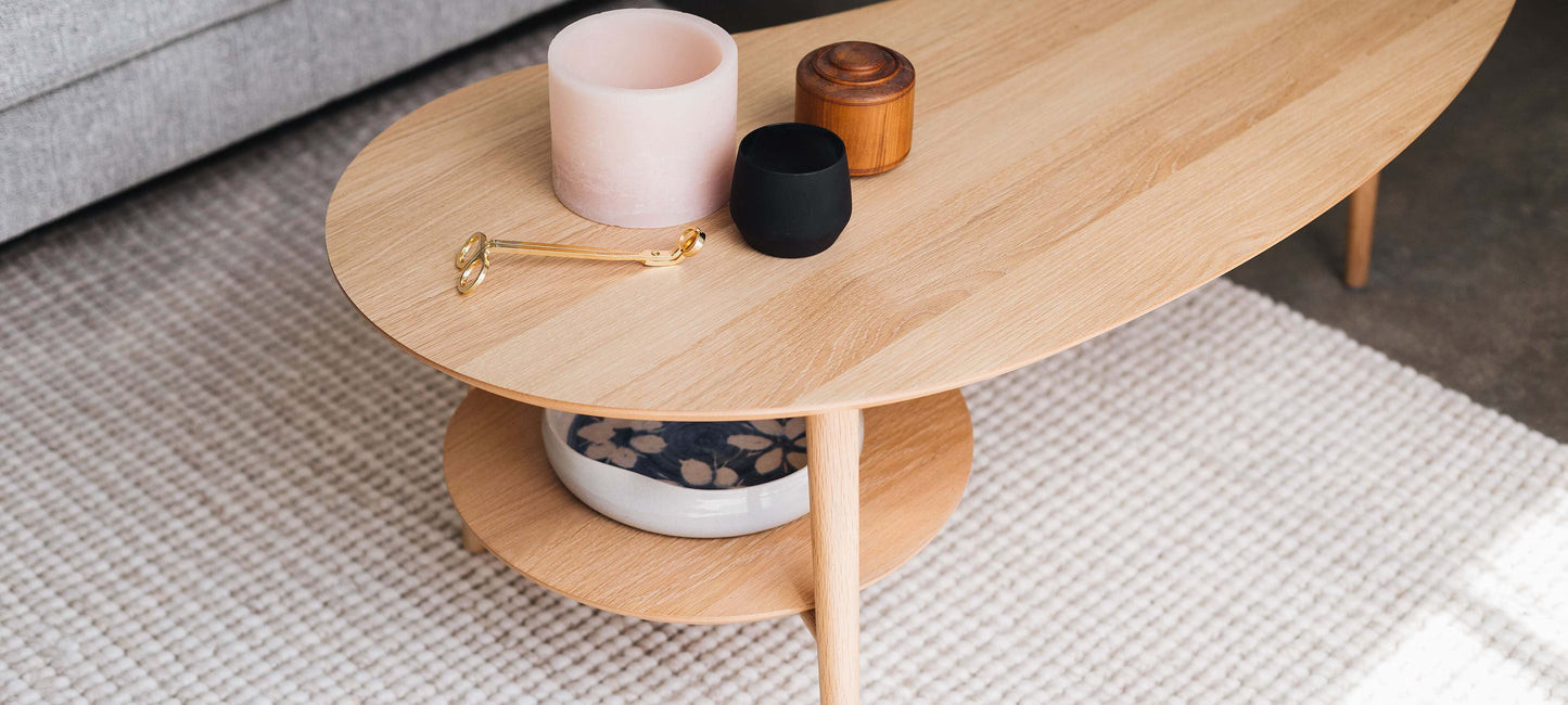 Scandinavian-inspired oak coffee table from the Oslo Collection with retro accents and mid-century design elements.