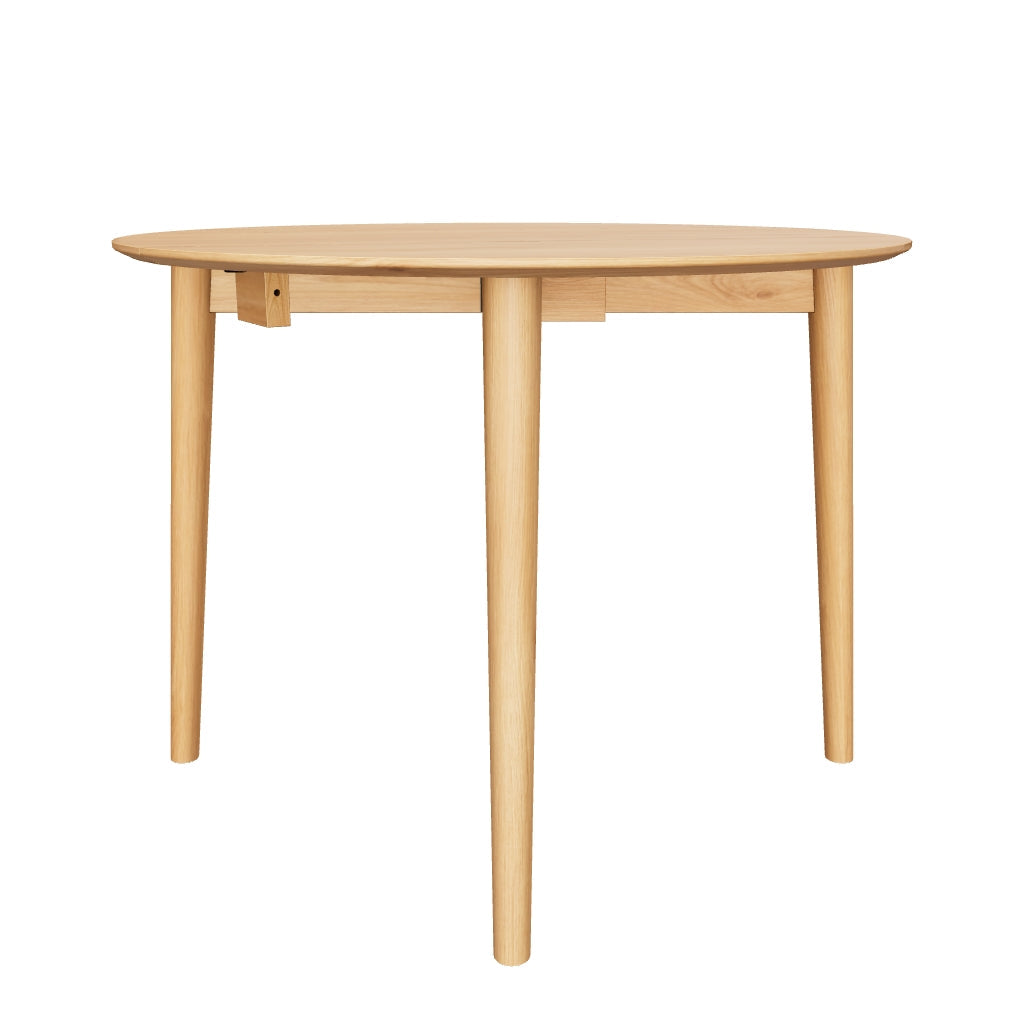 Nordik Round Drop-leaf Dining Table in American White Oak showcasing Scandinavian design with clean lines and timeless charm