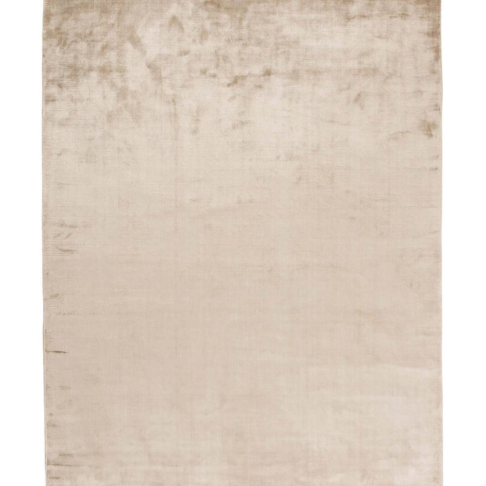Almeria Rug by Linie Design, showcasing Nordic minimalism and traditional Indian craftsmanship, in a beige color with fringe detailing.