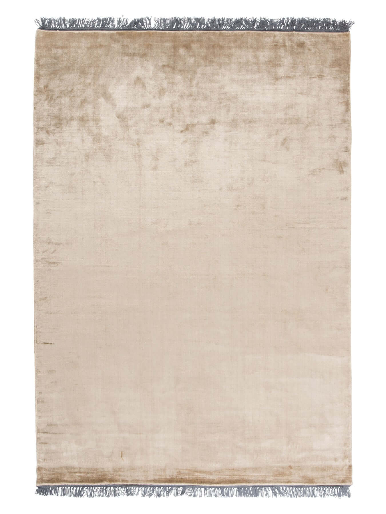 Almeria Rug by Linie Design, showcasing Nordic minimalism and traditional Indian craftsmanship, in a beige color with fringe detailing.