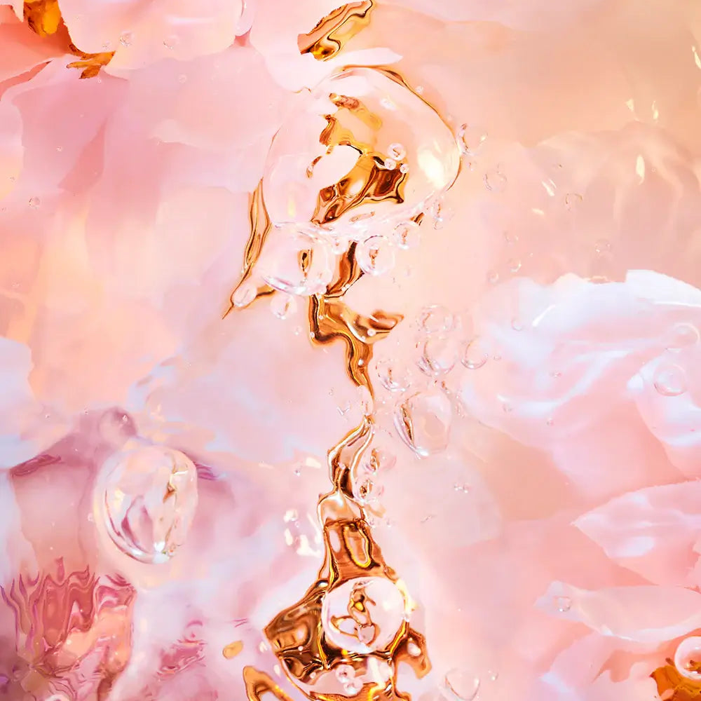 
                      
                        Abstract pink and gold blend in flowing water, depicting Flora Aquatica 02 art print with submerged bouquet by Stan Desjeux.
                      
                    