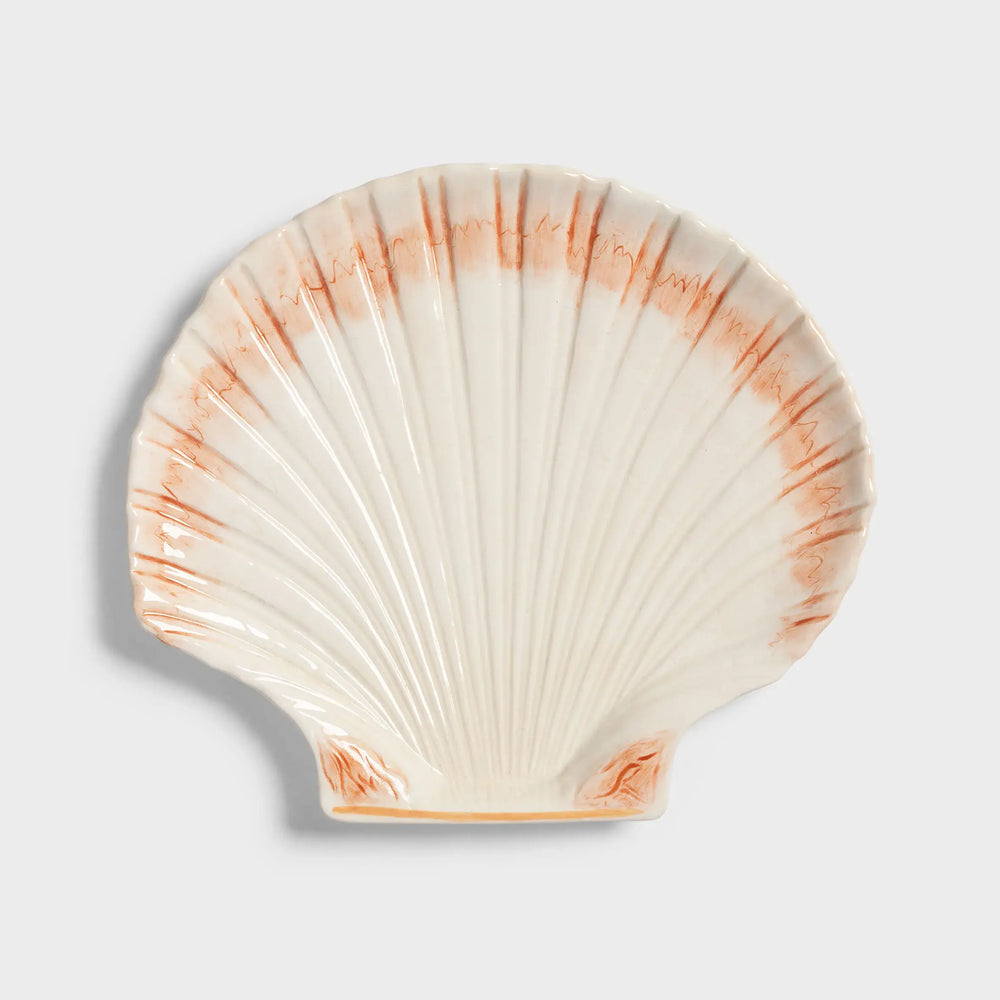 Stoneware cockle plate with orange accents, perfect for adding a coastal touch to your table setting.