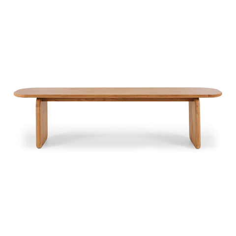 Panel sculptural oak dining bench, front view