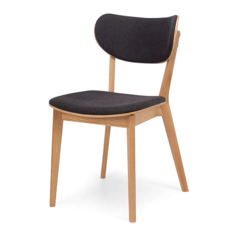 Zurich natural oak dining chair with dark grey upholstered seat, angled view