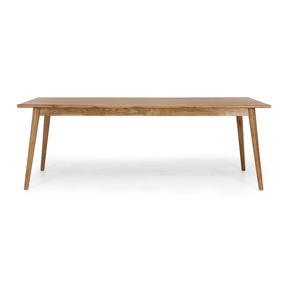 
                      
                        Reeves Dining Table in solid smoked oak, showcasing organic grain and tapered legs for a refined, elegant look.
                      
                    