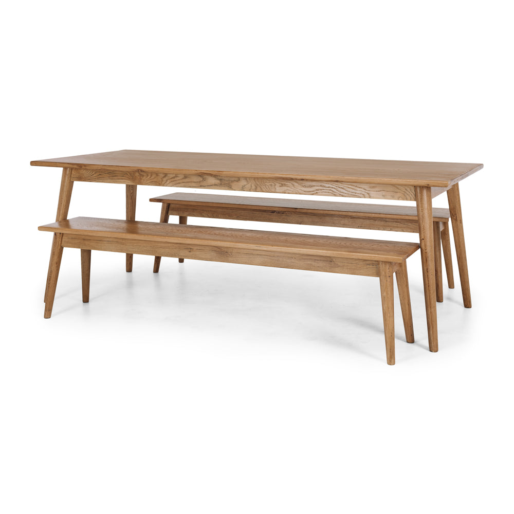 
                      
                        Reeves Dining Bench and table crafted from solid smoked oak with tapered legs, showcasing natural grain and smooth finish for style and durability.
                      
                    