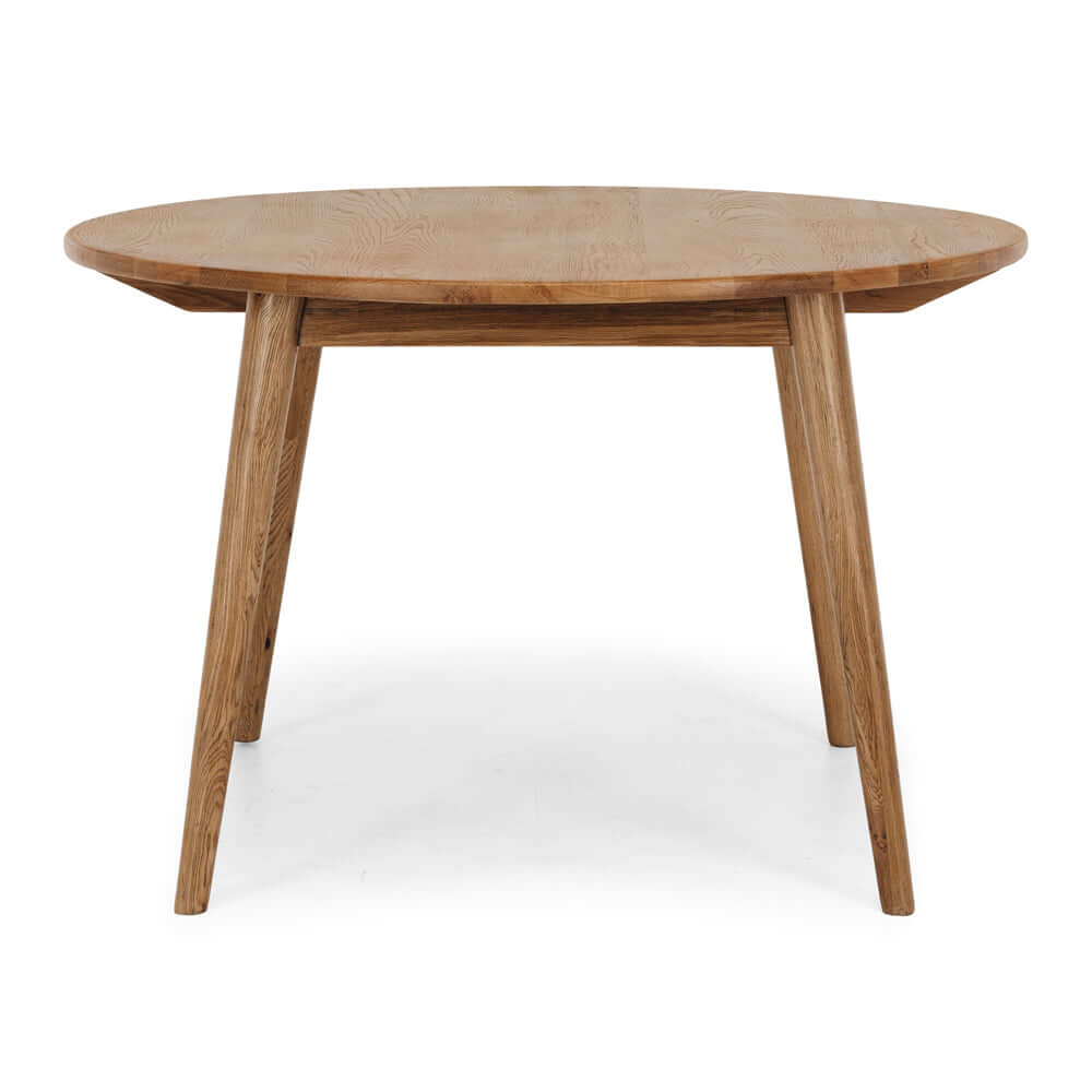 
                      
                        Reeves Dining Table - Round 120, crafted from solid smoked oak with tapered legs and a lightly polished finish.
                      
                    