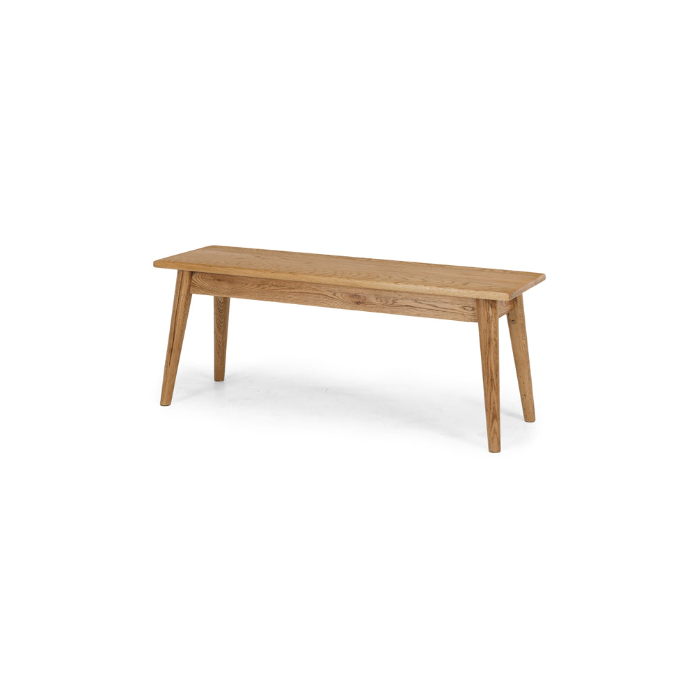 
                      
                        Reeves Dining Bench made of solid smoked oak with a natural grain finish, featuring tapered legs. Ideal for adding warmth to any dining space.
                      
                    