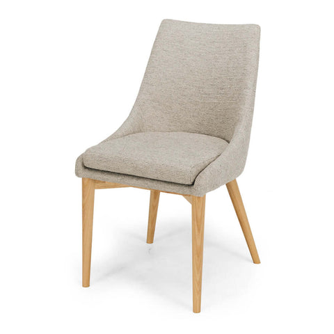 Light khaki Eva upholstered dining chair, angled front view on a white background