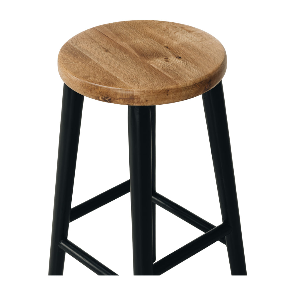 
                      
                        Rye Oak Bar Stool with black legs and round seat, crafted from solid oak, showcasing natural grain, ideal for compact spaces.
                      
                    