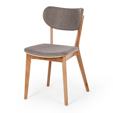 Zurich natural oak dining chair with light grey upholstered seat, angled view
