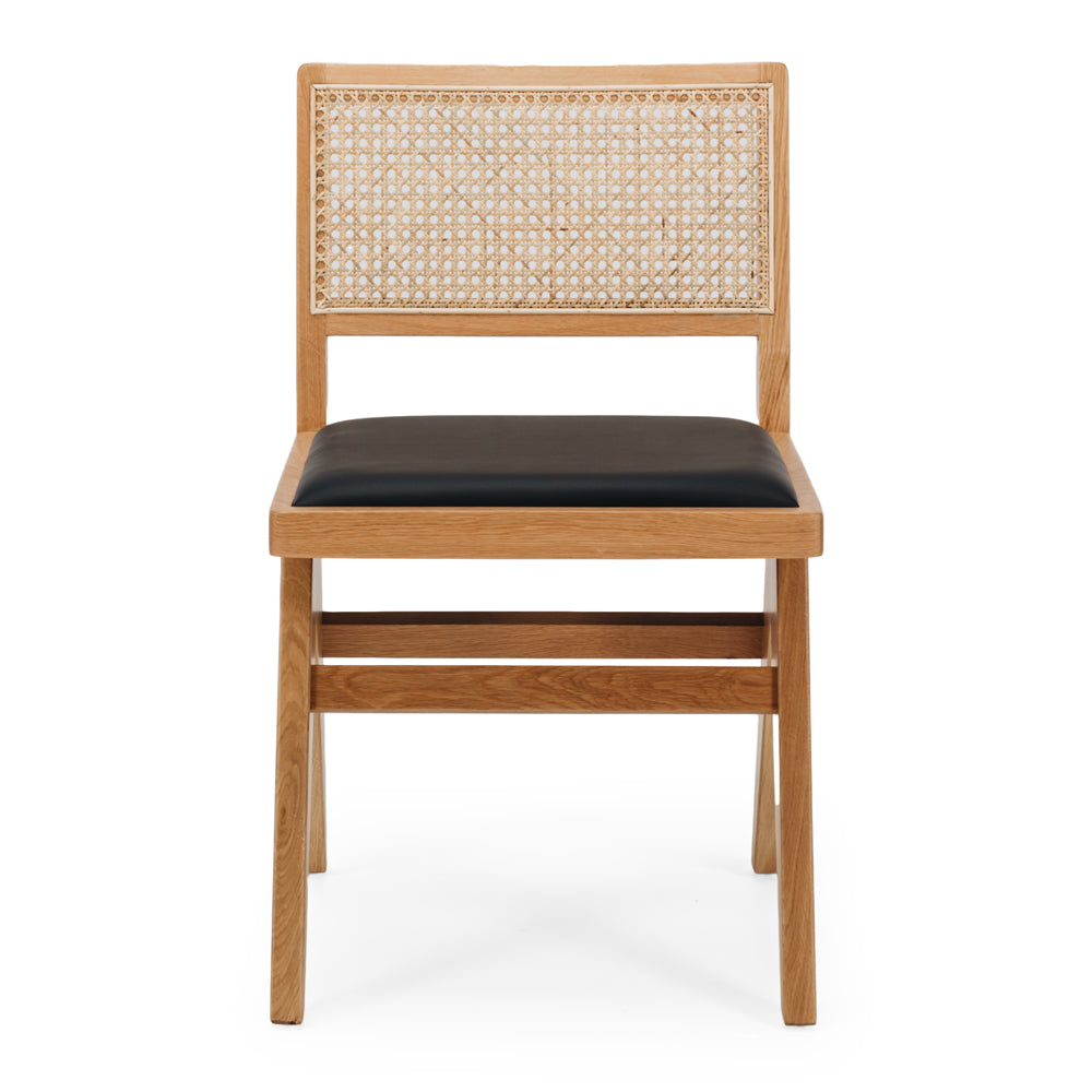 
                      
                        Palma Dining Chair in Japandi style, solid oak frame with natural finish, black padded seat, perfect for minimalist decor.
                      
                    