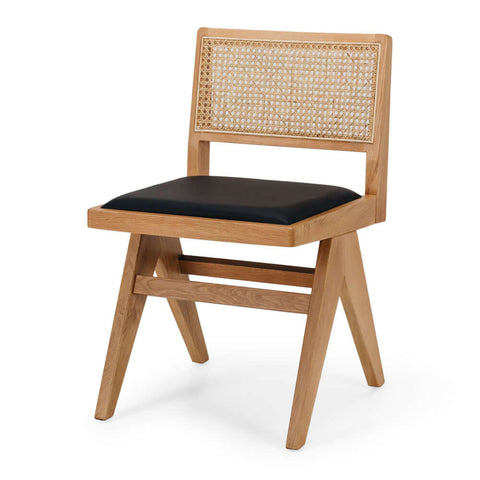 Palma natural oak dining chair with black PU seat, angled front view