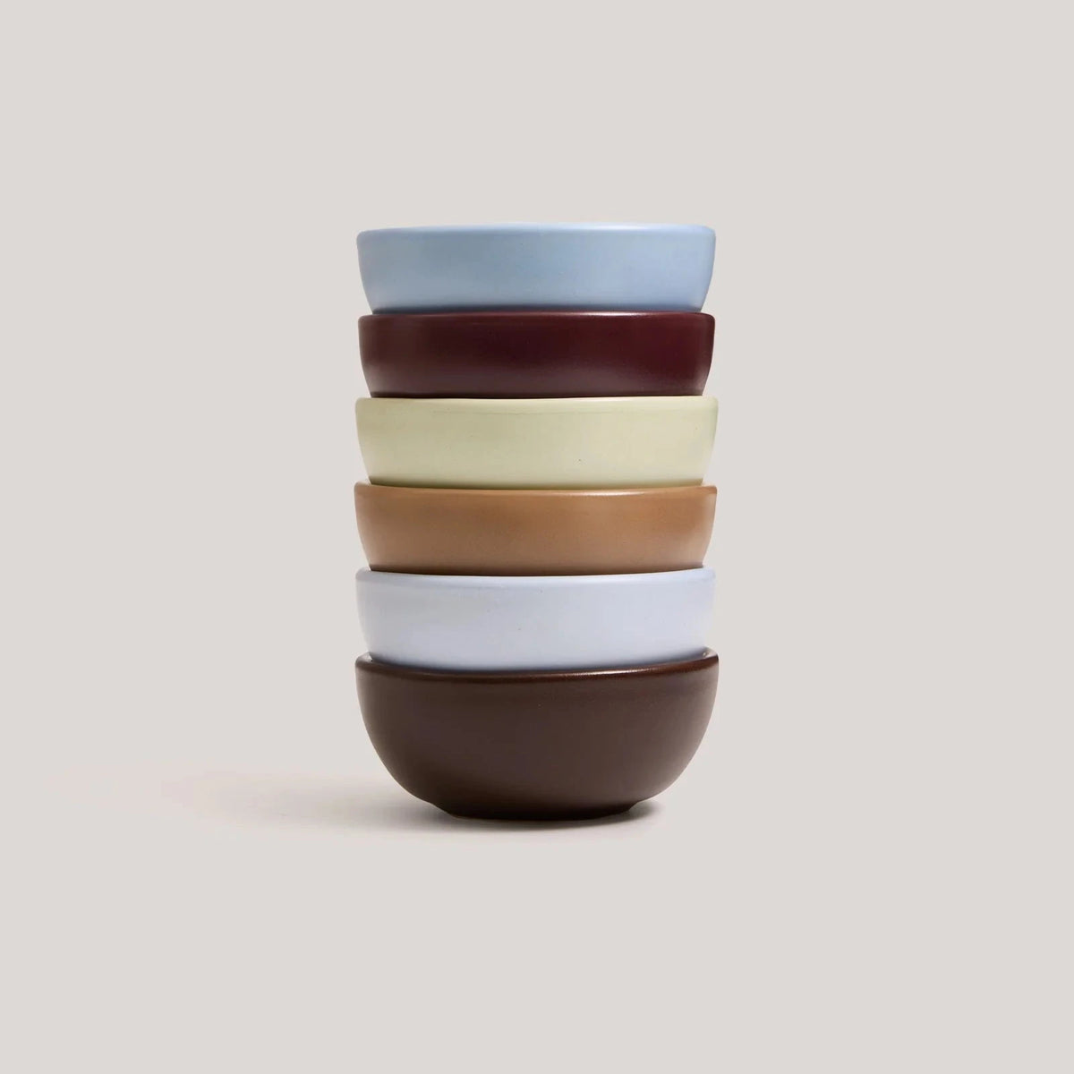 Hommey dip bowls stacked, on a white background