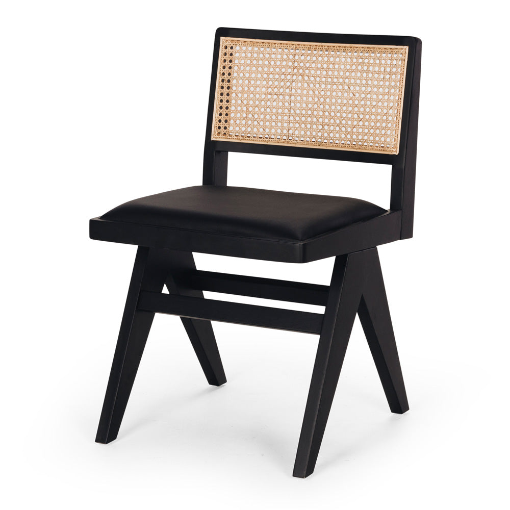 
                      
                        Palma Dining Chair in Japandi style with black solid oak frame, padded seat, and woven backrest for minimalist elegance.
                      
                    