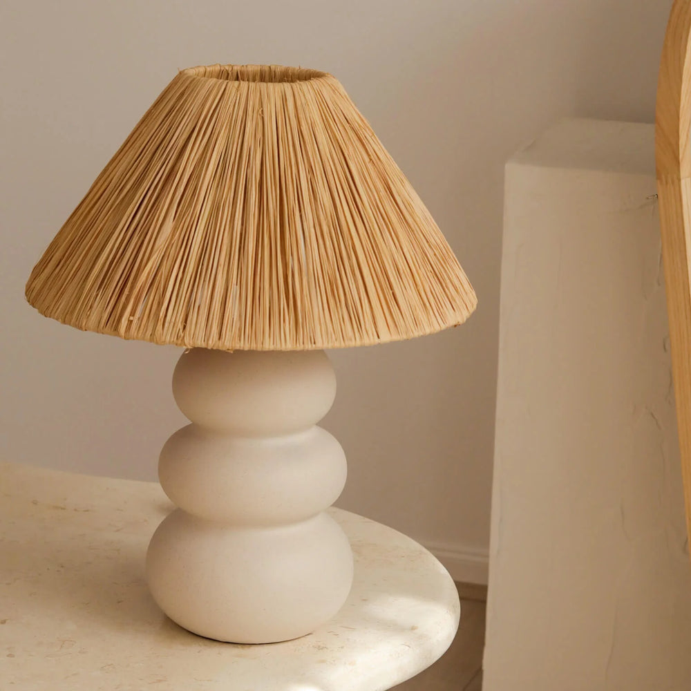 
                      
                        Sofia Raffia Table Lamp-FurniturebyDesign.
                      
                    