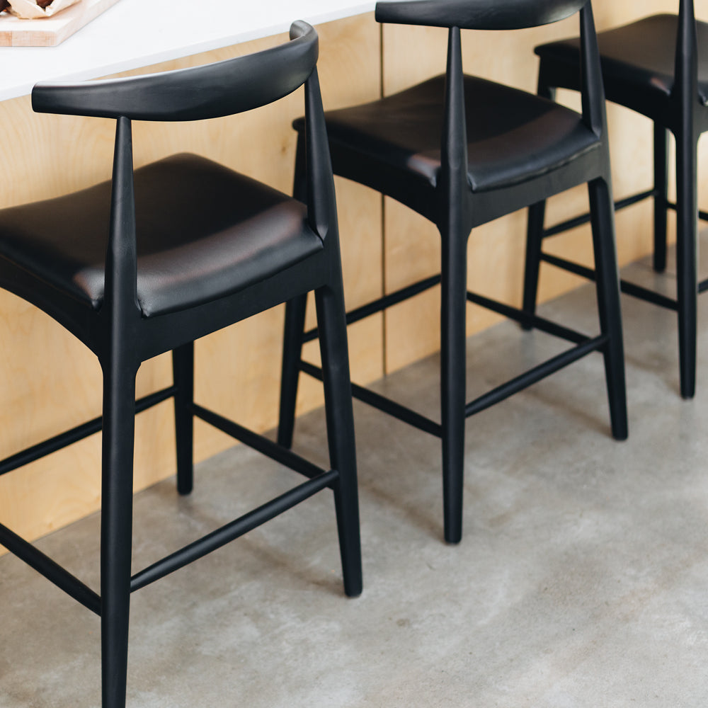 
                      
                        Elbow Bar Stool
                      
                    