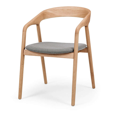 Black oak Nora dining chair with black PU seat, angled front view