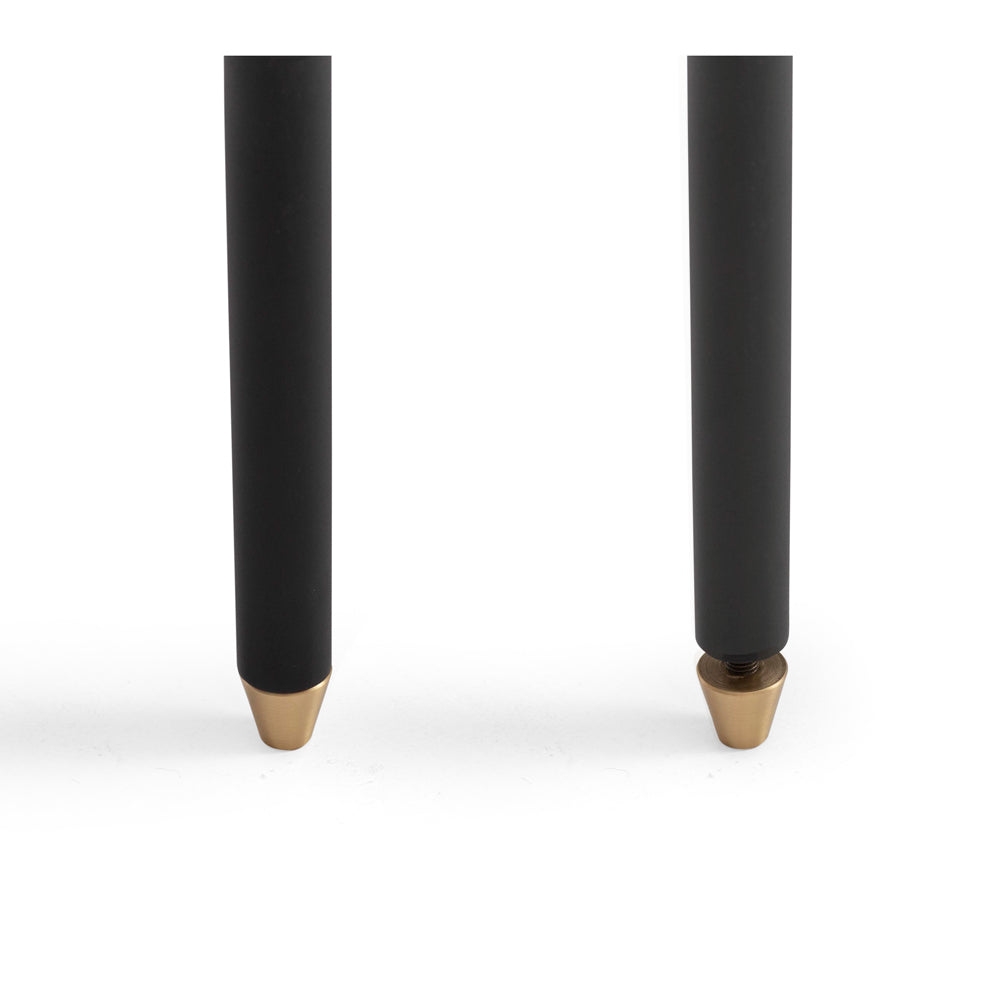 
                      
                        Black metal legs with brushed brass accents from the Dawn TV Unit 120, showcasing industrial-chic design and sturdy construction.
                      
                    