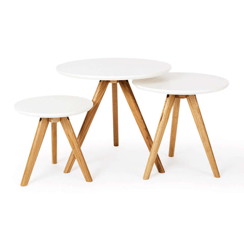 Radius white and oak nesting tables, angled front view