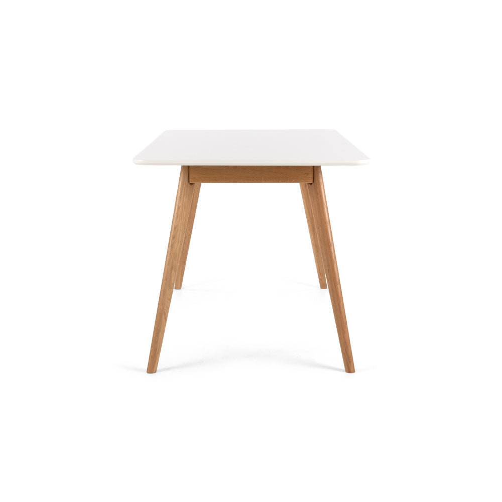 
                      
                        Radius Dining Table
                      
                    