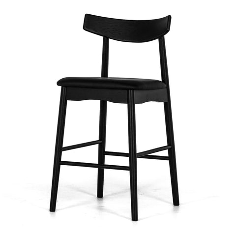 Black oak barstool with a black upholstered seat and curved backrest on a white background, shown from an angled view