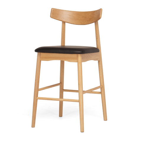 Natural oak barstool with a black upholstered seat and curved backrest on a white background, shown from an angled view