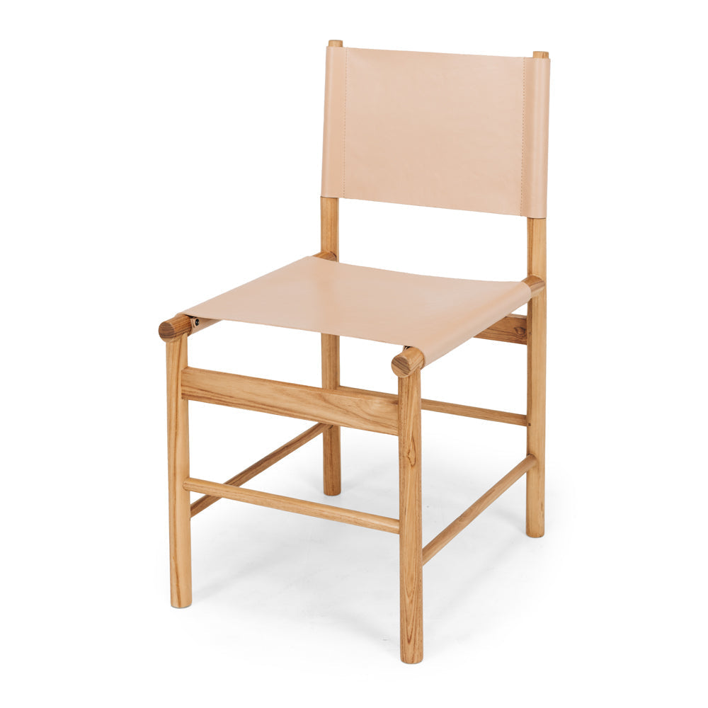Ned teak dining chair with plush pink leather seat, angled front view