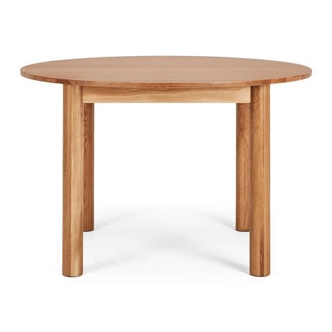 Oliver round oak dining table, angled front view